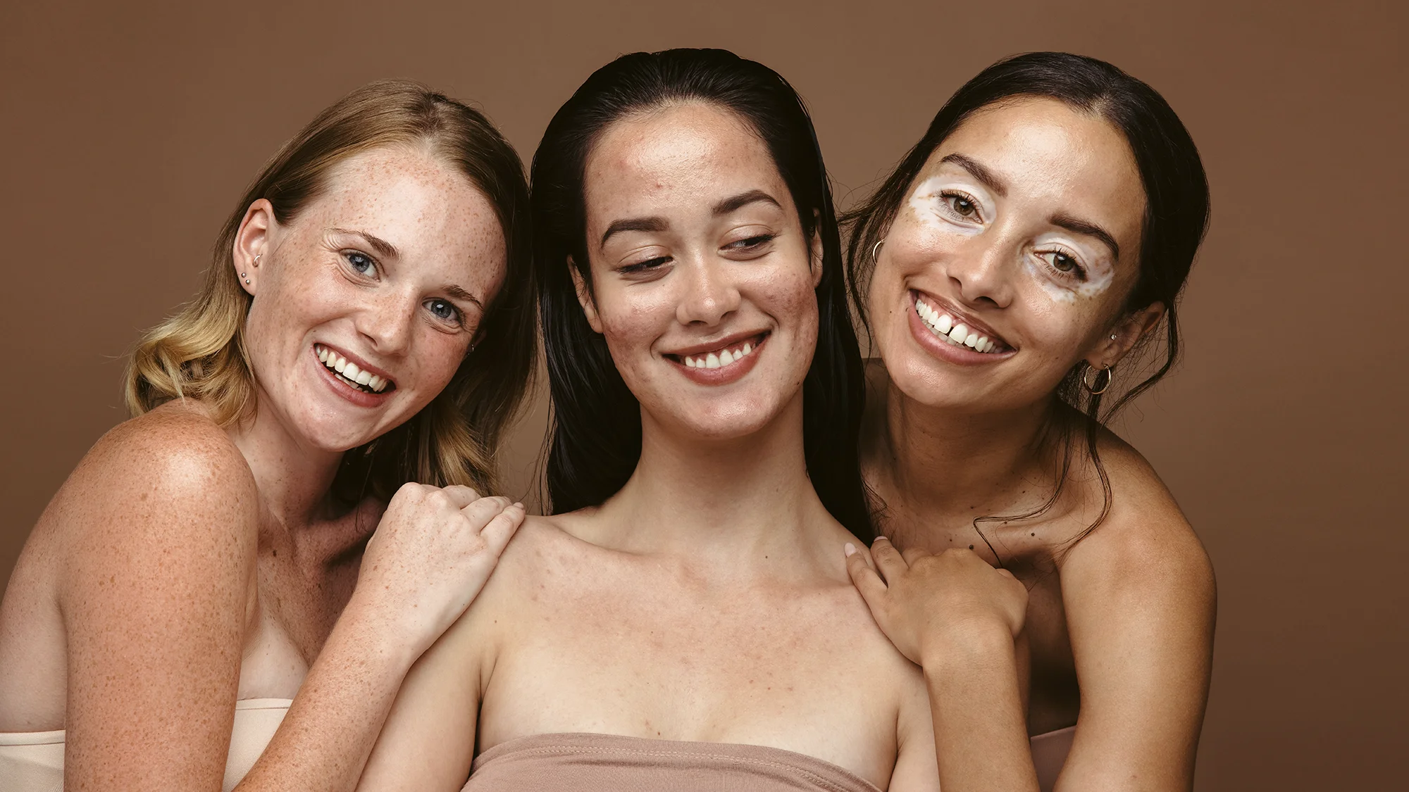 A group of women pose together.
